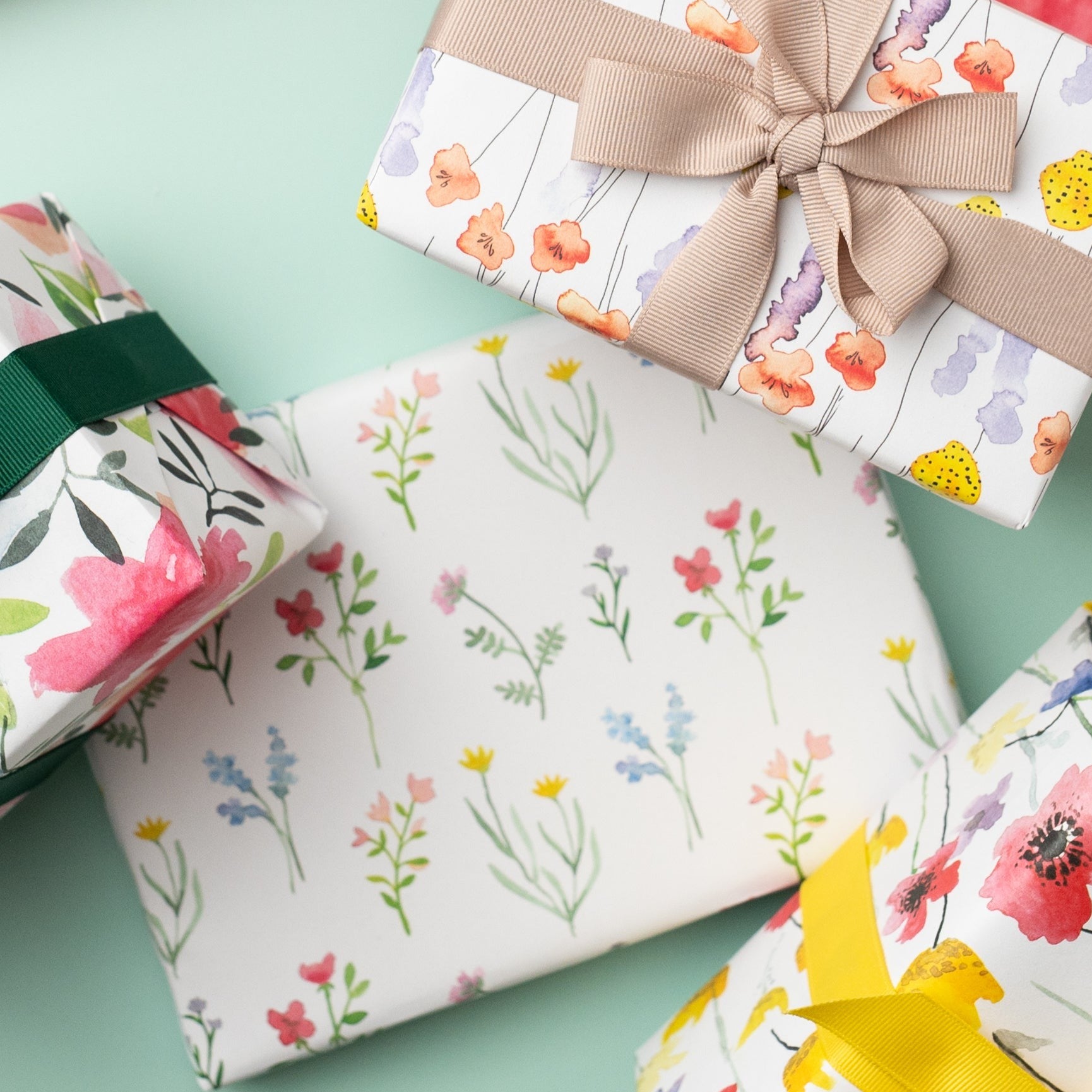 a present wrapped in Ruby & Bo wildflower recycled wrap