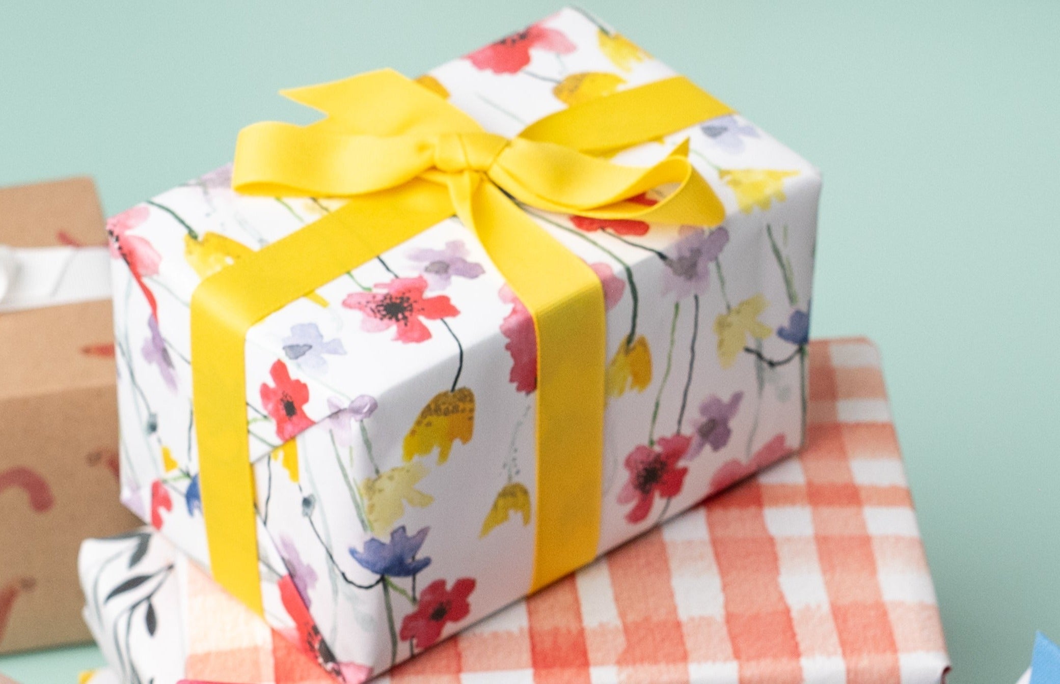 A present wrapped in Ruby & Bo Poppy Meadow Recycled Wrap