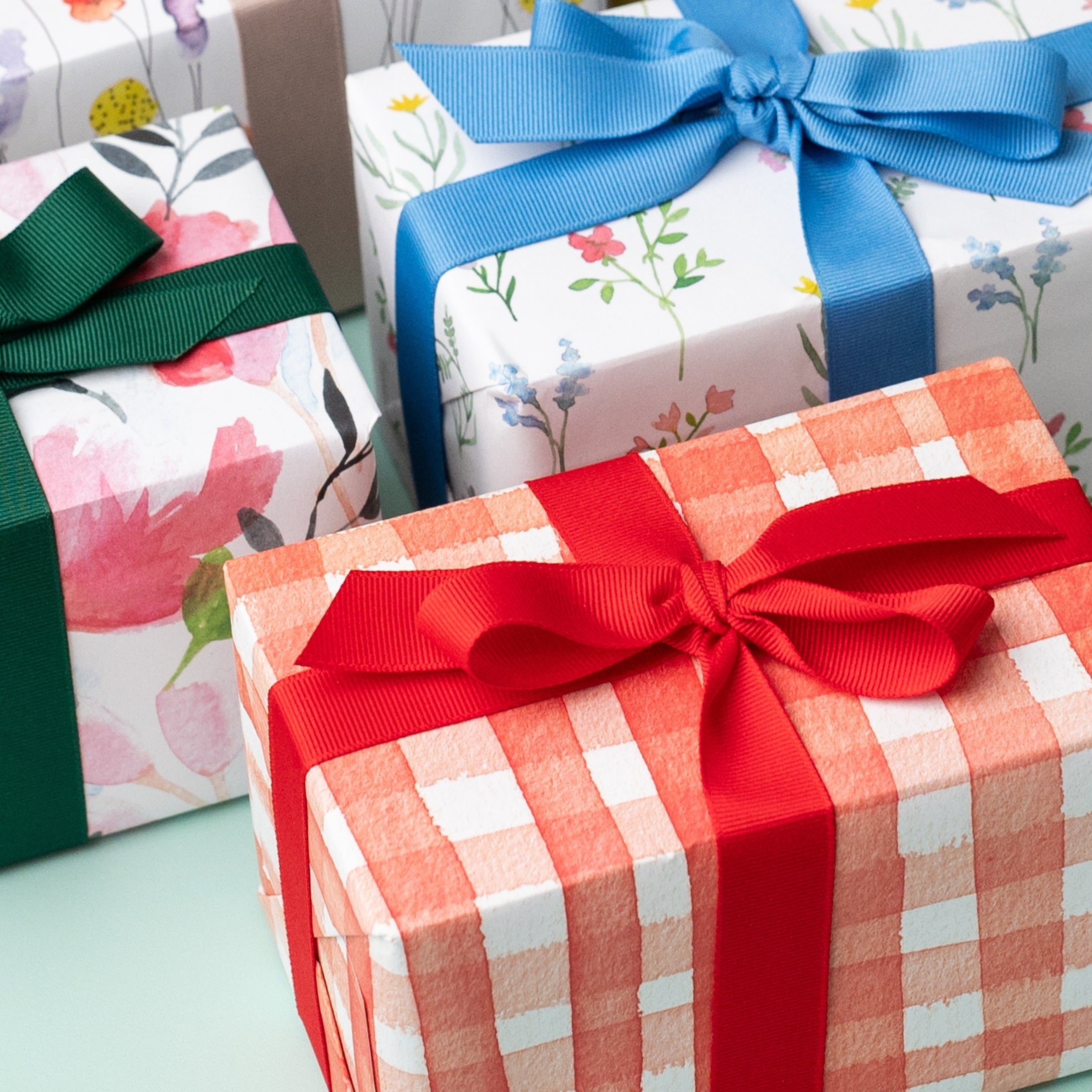 A present wrapped in Ruby & Bo gingham recycled wrap