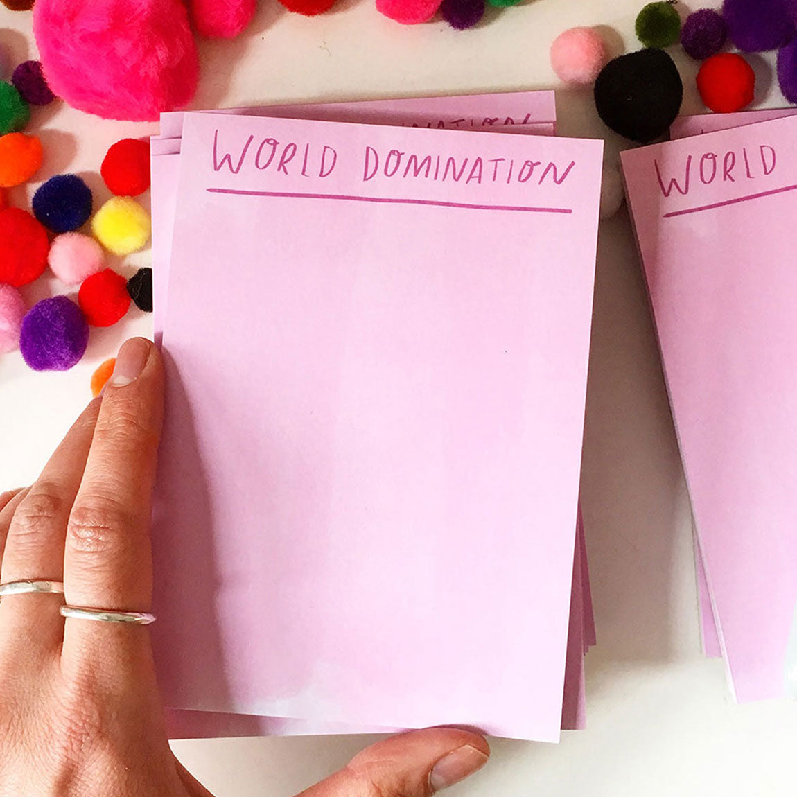 Pink notepad with &
