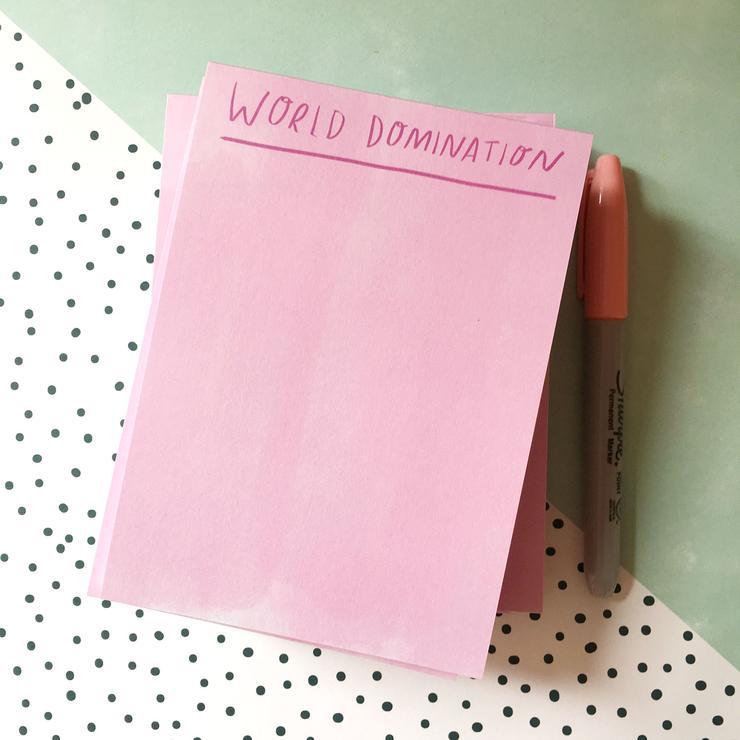 Pink notepad with &