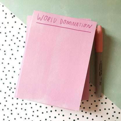 Pink notepad with &